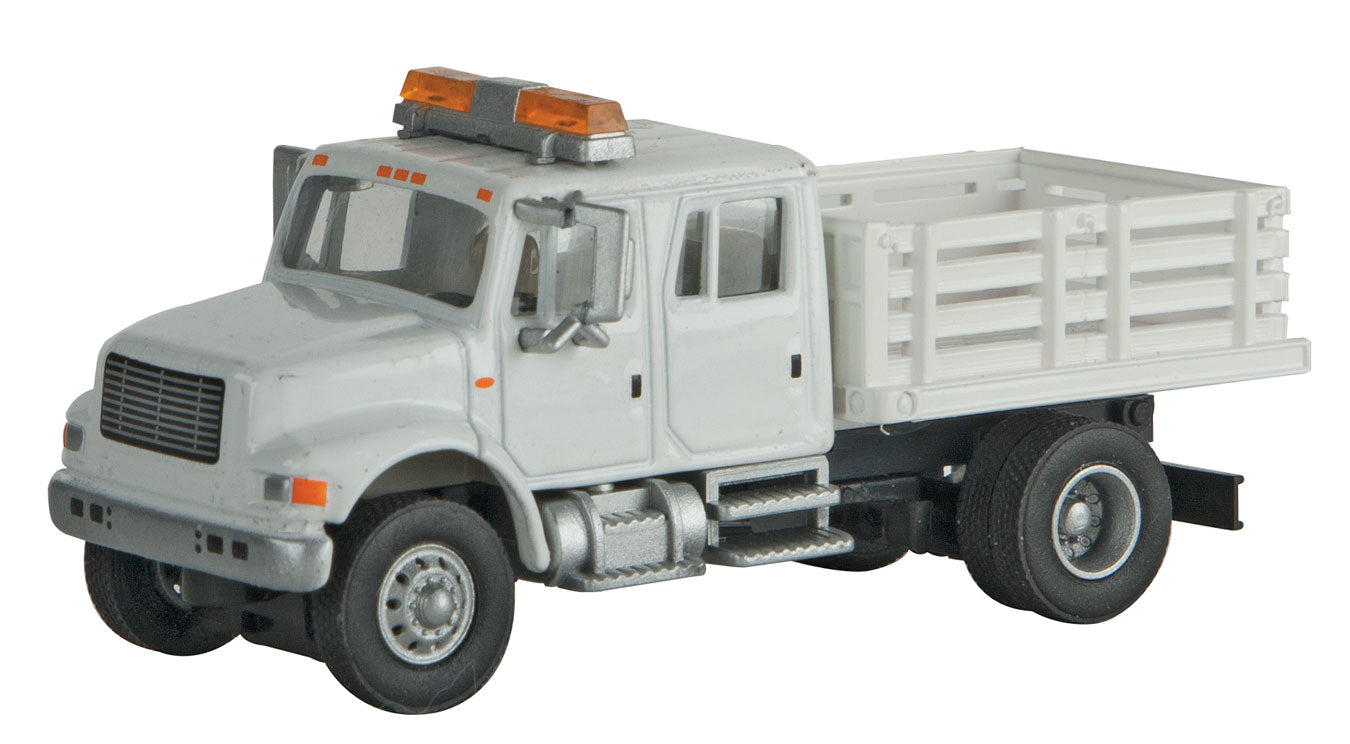 International 4900 Open Stake Bed Utility Truck - Assembled -- White w/Railroad Maintenance-of-Way Logo Decals